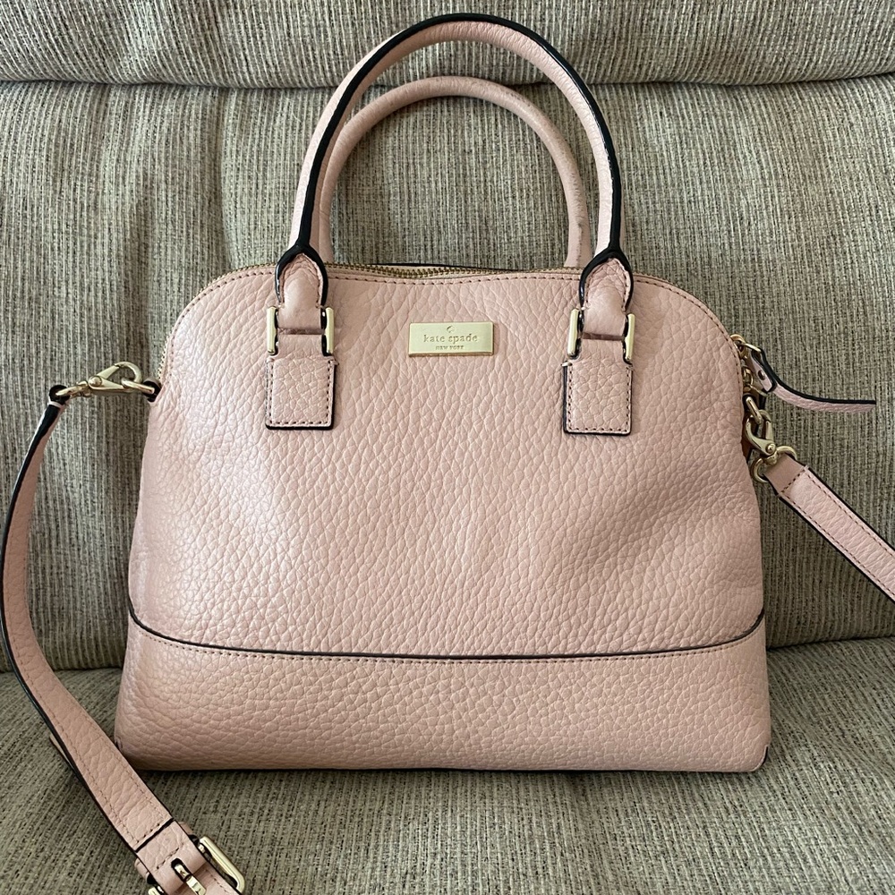 Kate Spade handbag with shoulder strap and matching wallet.